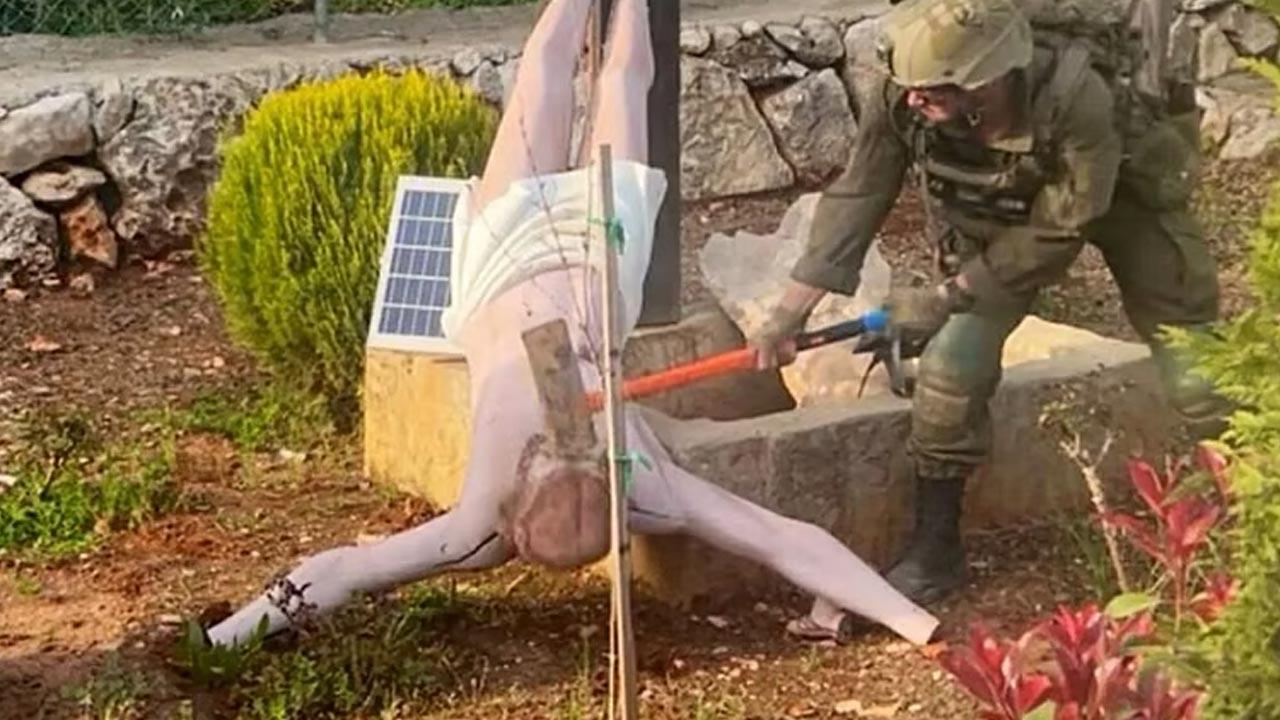 இயேசு கிறிஸ்து சிலையை அடித்து உடைத்த இஸ்ரேல் ராணுவ வீரர்!