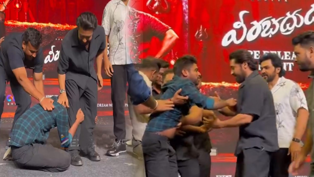 திடீரென மேடையில் ஏறி சூர்யா ரசிகர் செய்த செயல்!